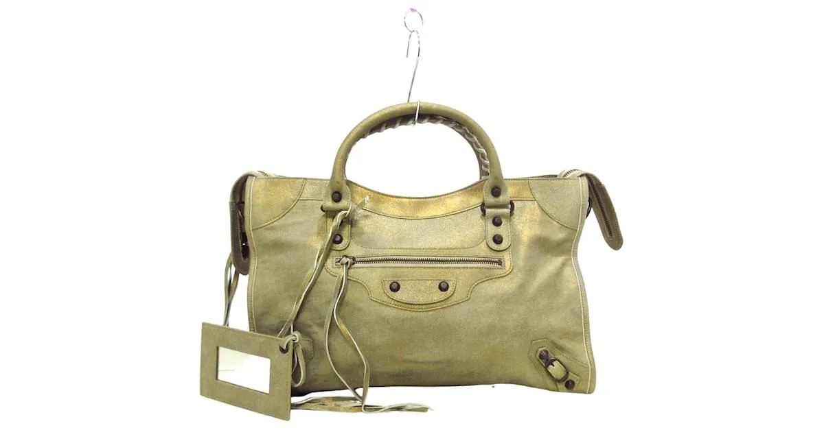 City Ciudad balenciaga Dorado 