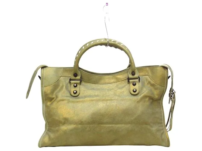 City Ciudad balenciaga Dorado 
